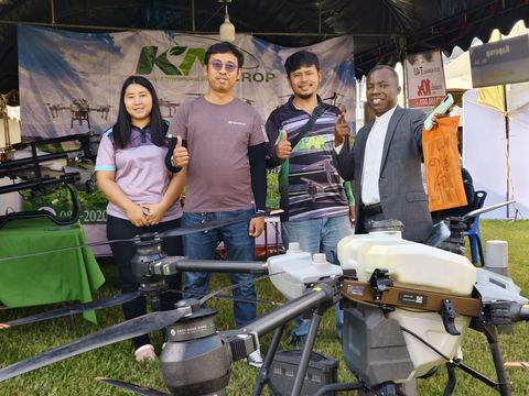 Exhibition stand with agricultural drones on display